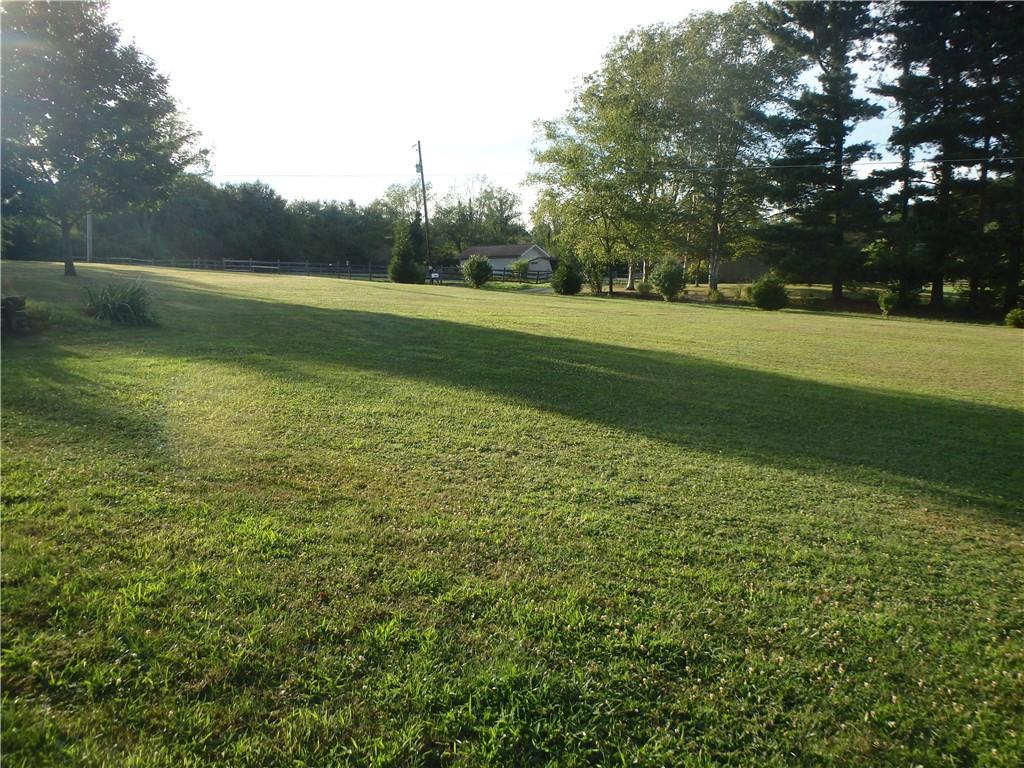 109 Youkers Road Butler, PA 16001 - Photo 29 of 30 a view of outdoor space with green field and trees all around