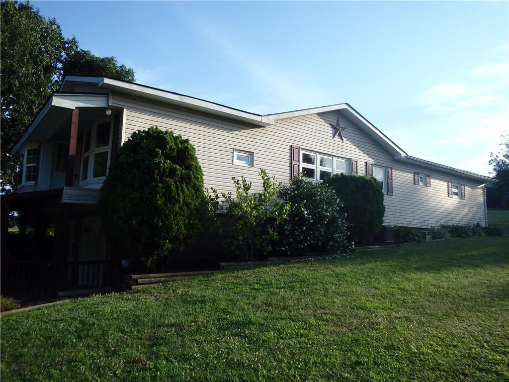 109 Youkers Road Butler, PA 16001 - Photo 30 of 30 a view of a house with backyard and garden