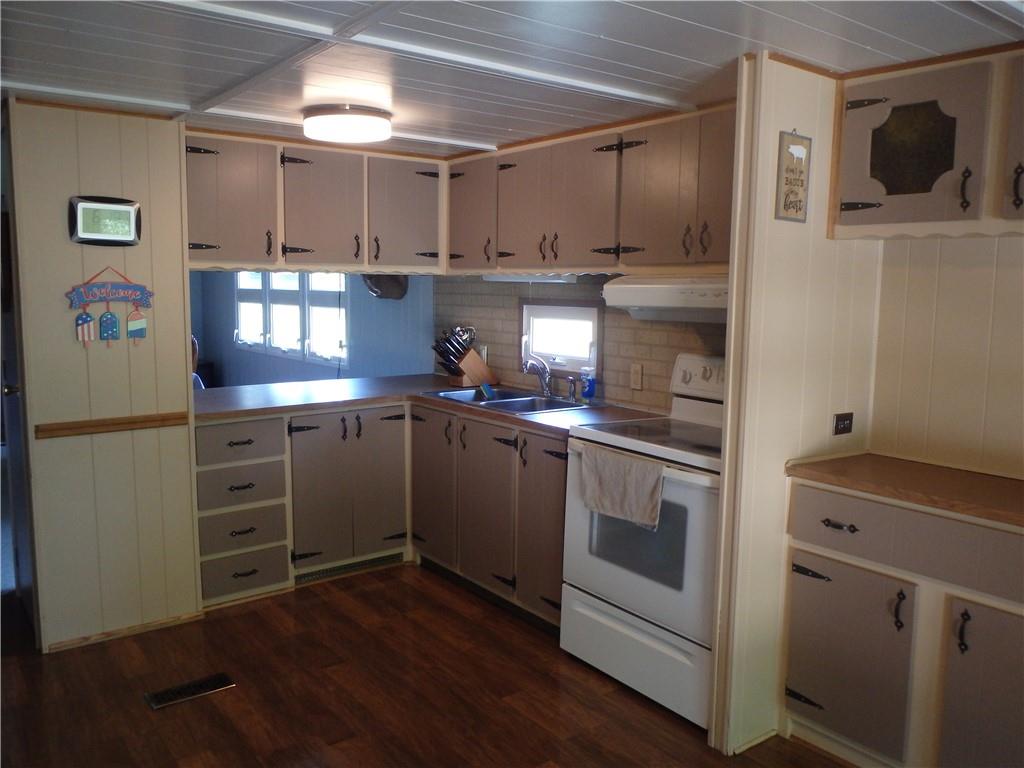 109 Youkers Road Butler, PA 16001 - Photo 4 of 30 a kitchen with stainless steel appliances granite countertop a refrigerator and a stove top oven