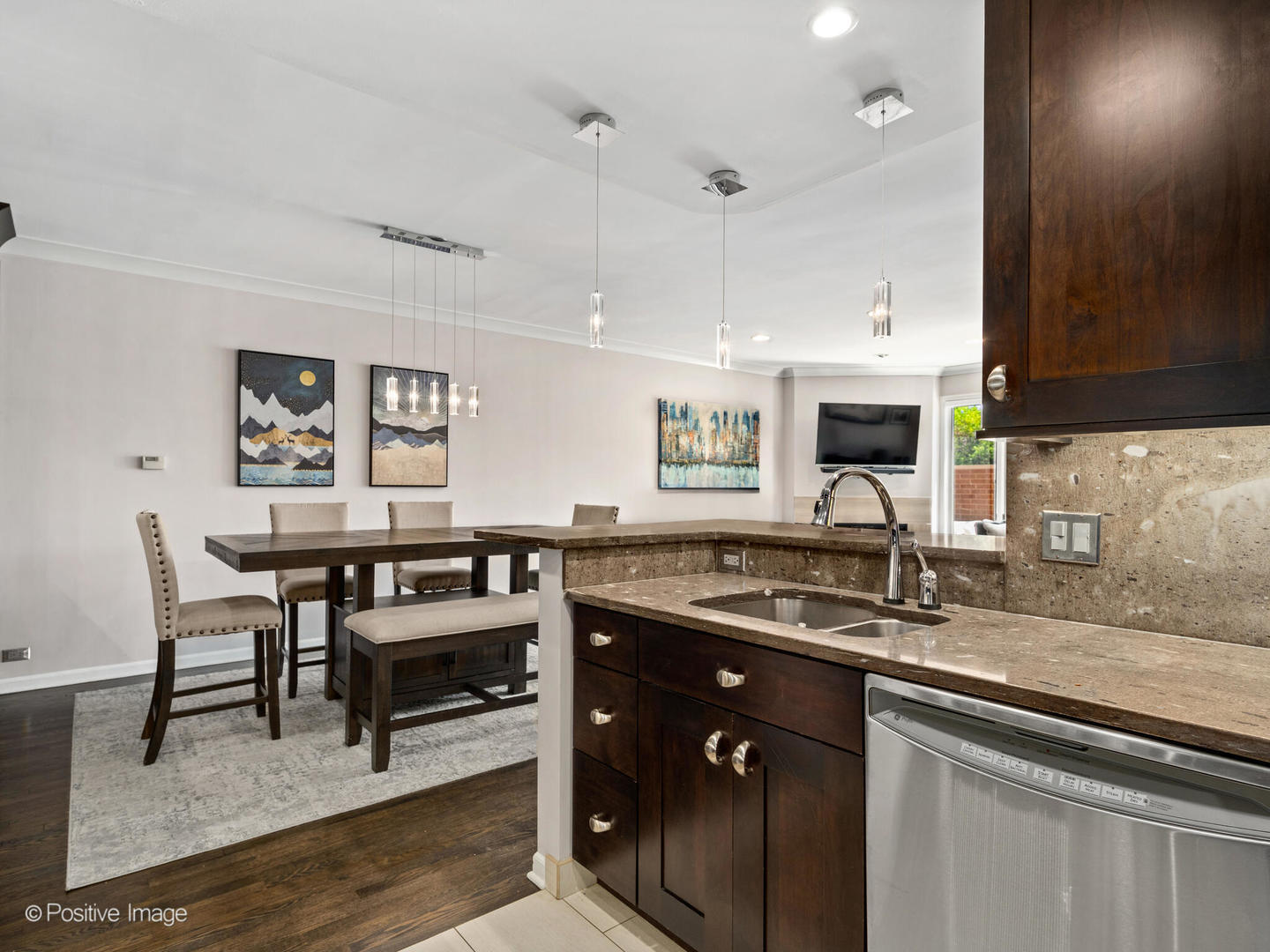 1720 North LaSalle Drive, Unit 1 Chicago, IL 60614 - Photo 11 of 28 a kitchen with stainless steel appliances granite countertop a sink stove and cabinets