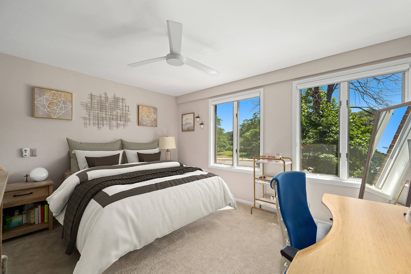 1720 North LaSalle Drive, Unit 1 Chicago, IL 60614 - Photo 13 of 28 a spacious bedroom with a large bed and a large window