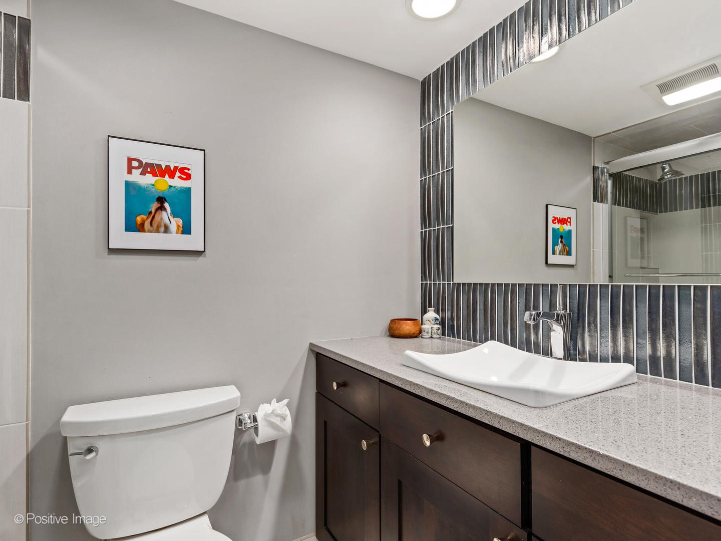 1720 North LaSalle Drive, Unit 1 Chicago, IL 60614 - Photo 19 of 28 a bathroom with a sink a toilet and a mirror