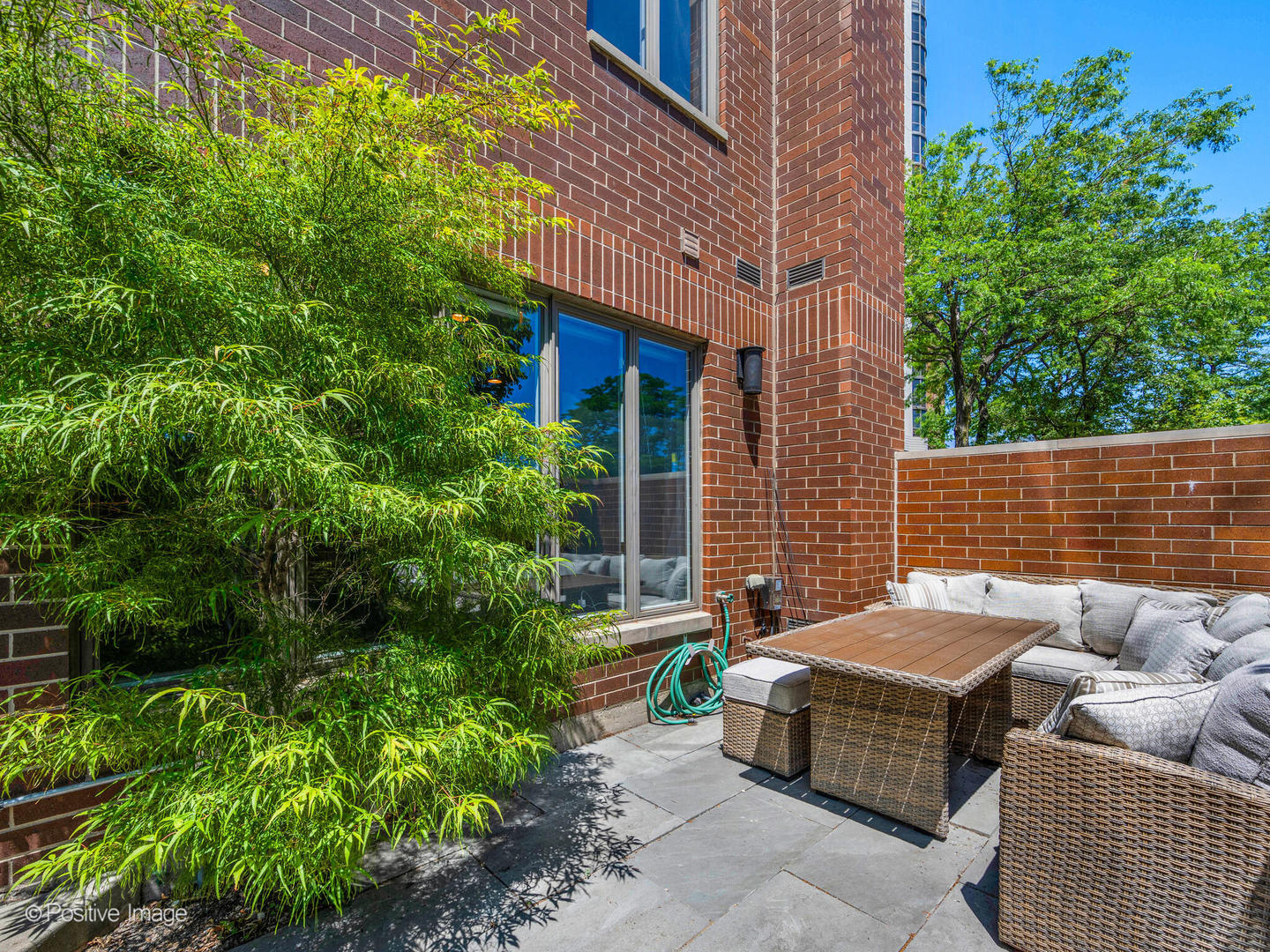 1720 North LaSalle Drive, Unit 1 Chicago, IL 60614 - Photo 20 of 28 a view of backyard with outdoor seating and plants