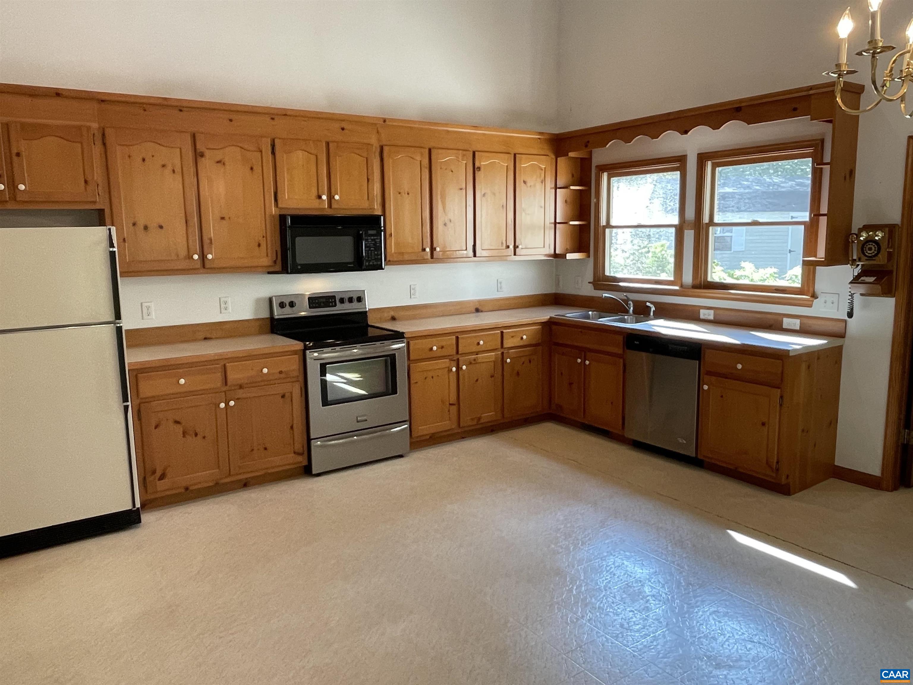 34 Fairview Lane Palmyra, VA 22963 - Photo 19 of 37 a kitchen with stainless steel appliances granite countertop a stove sink and cabinets