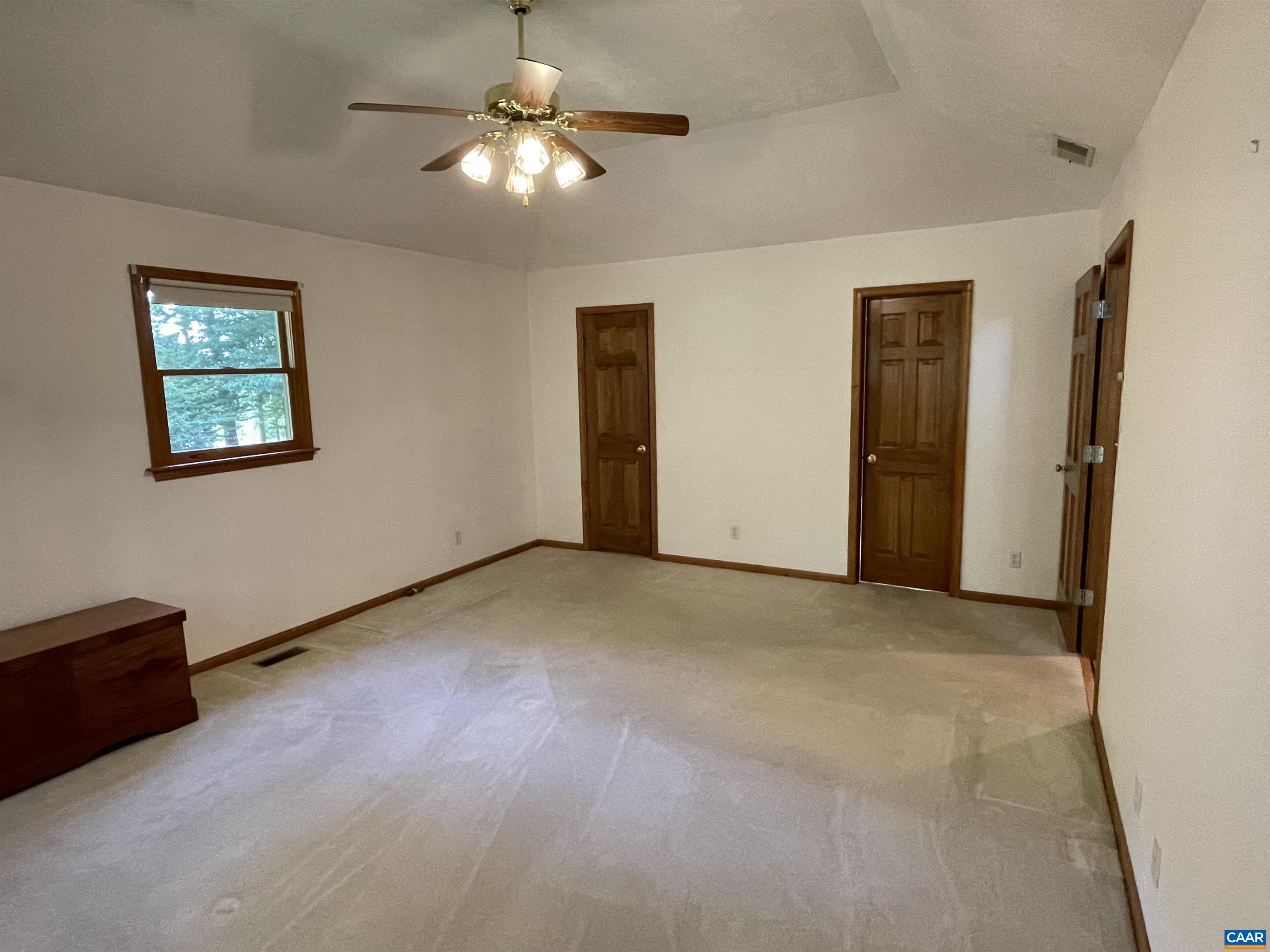 34 Fairview Lane Palmyra, VA 22963 - Photo 22 of 37 a view of a livingroom with a ceiling fan and window