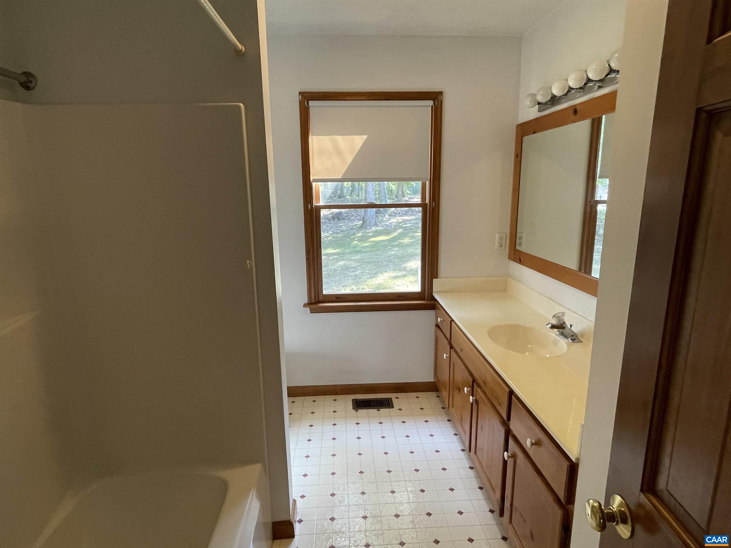 34 Fairview Lane Palmyra, VA 22963 - Photo 24 of 37 a bathroom with a bathtub and a shower