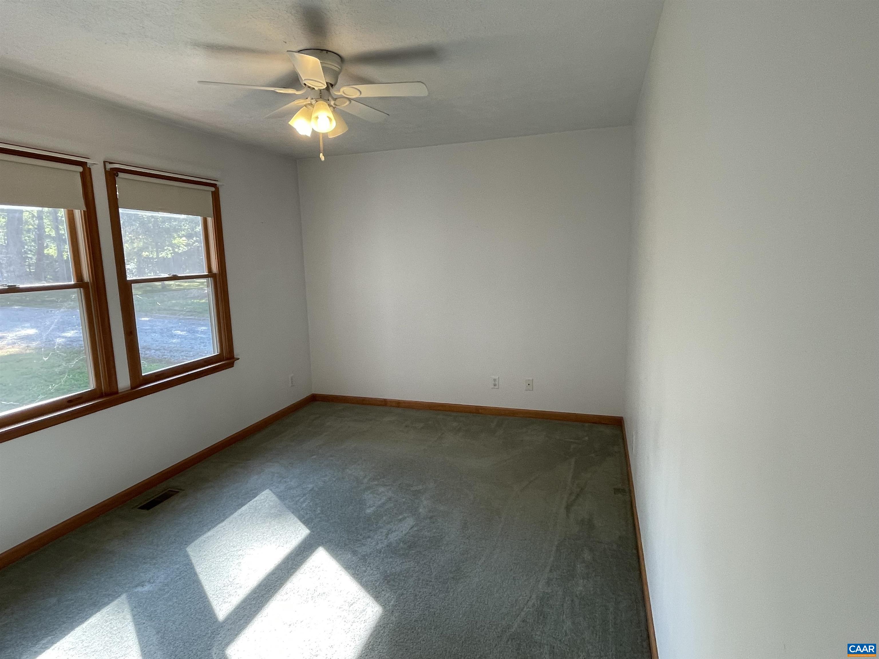 34 Fairview Lane Palmyra, VA 22963 - Photo 25 of 37 an empty room with windows and fan