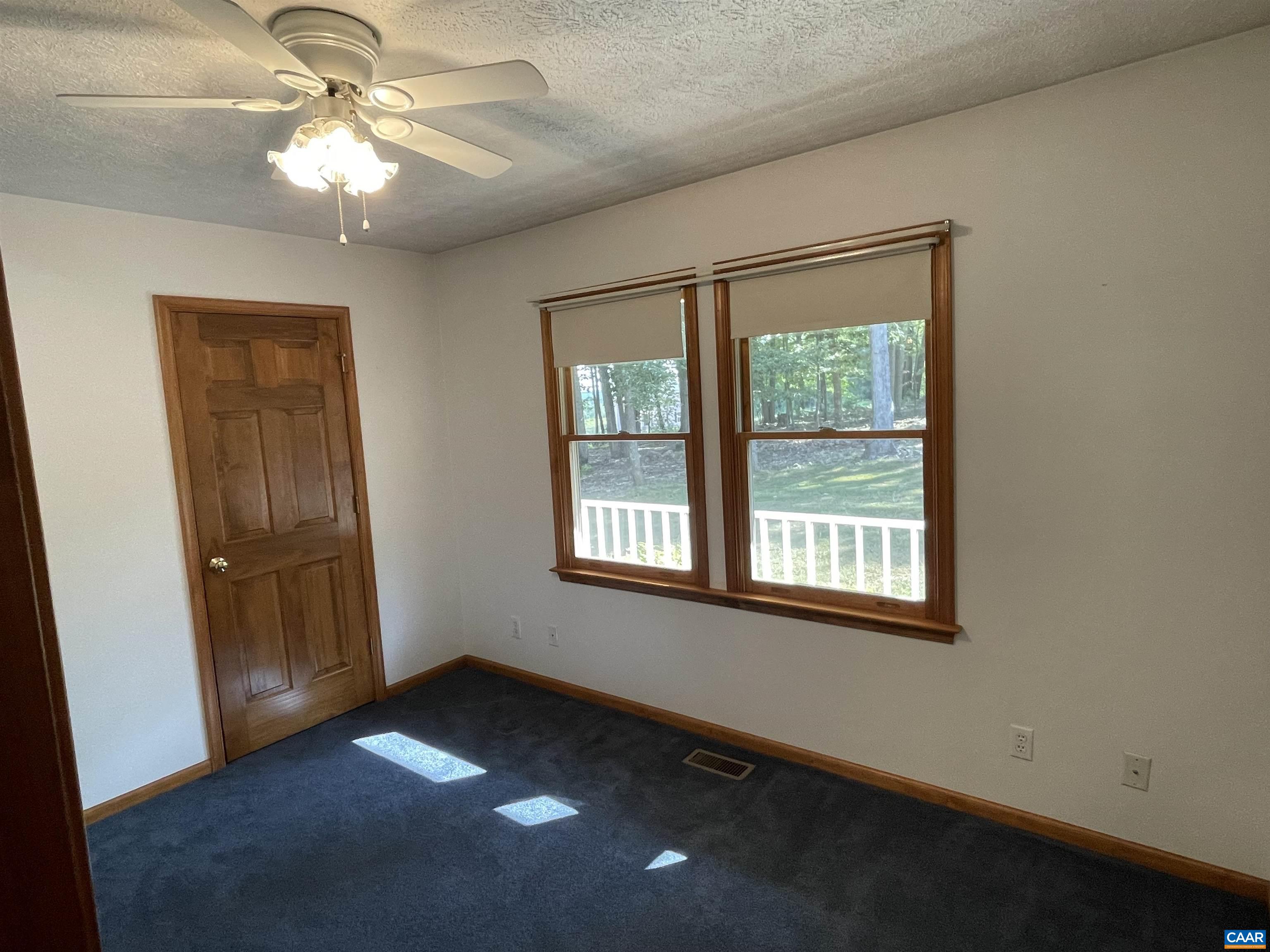34 Fairview Lane Palmyra, VA 22963 - Photo 26 of 37 an empty room with windows and fan