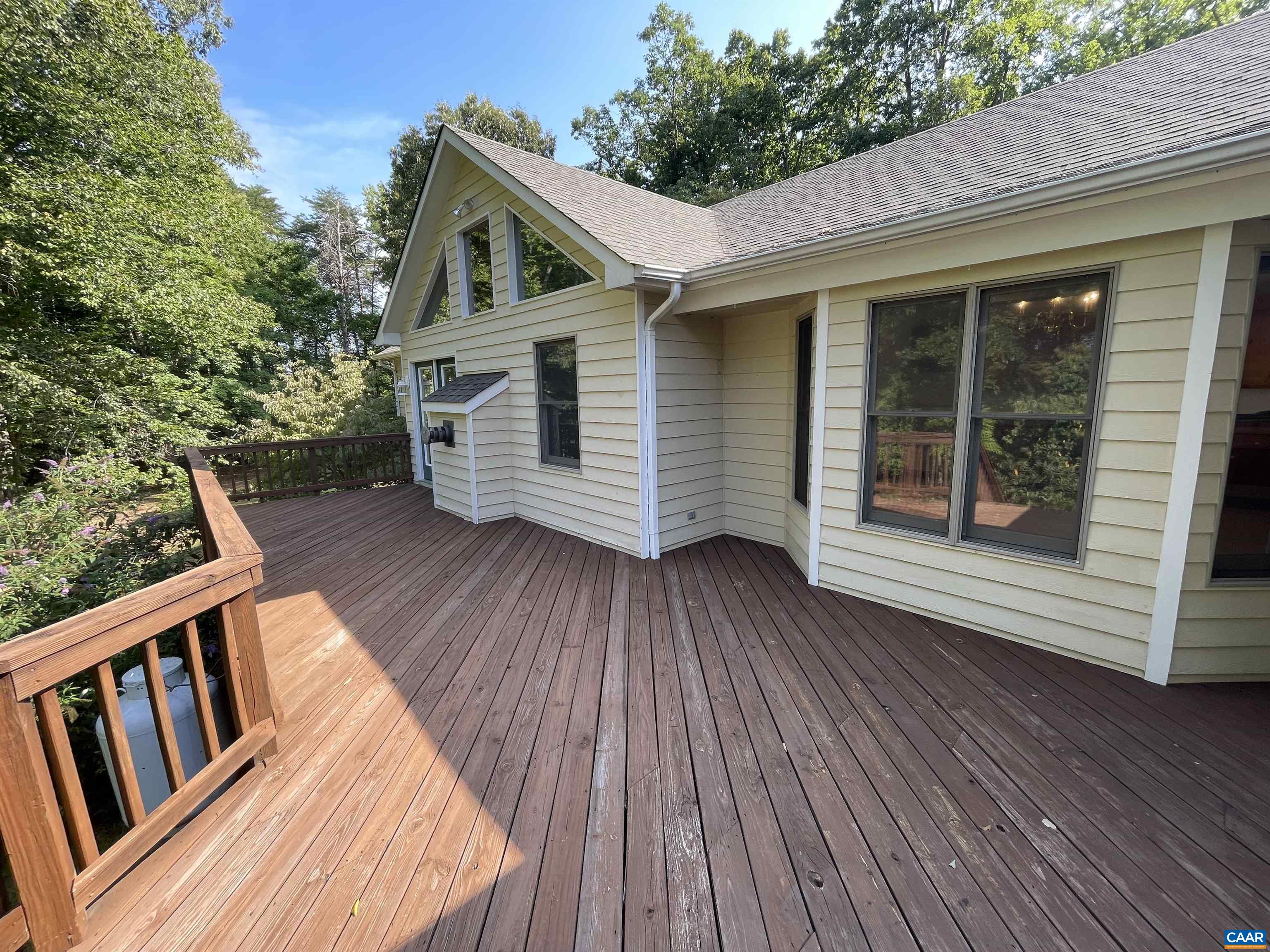 34 Fairview Lane Palmyra, VA 22963 - Photo 5 of 37 a view of deck with wooden floor and fence with a garden