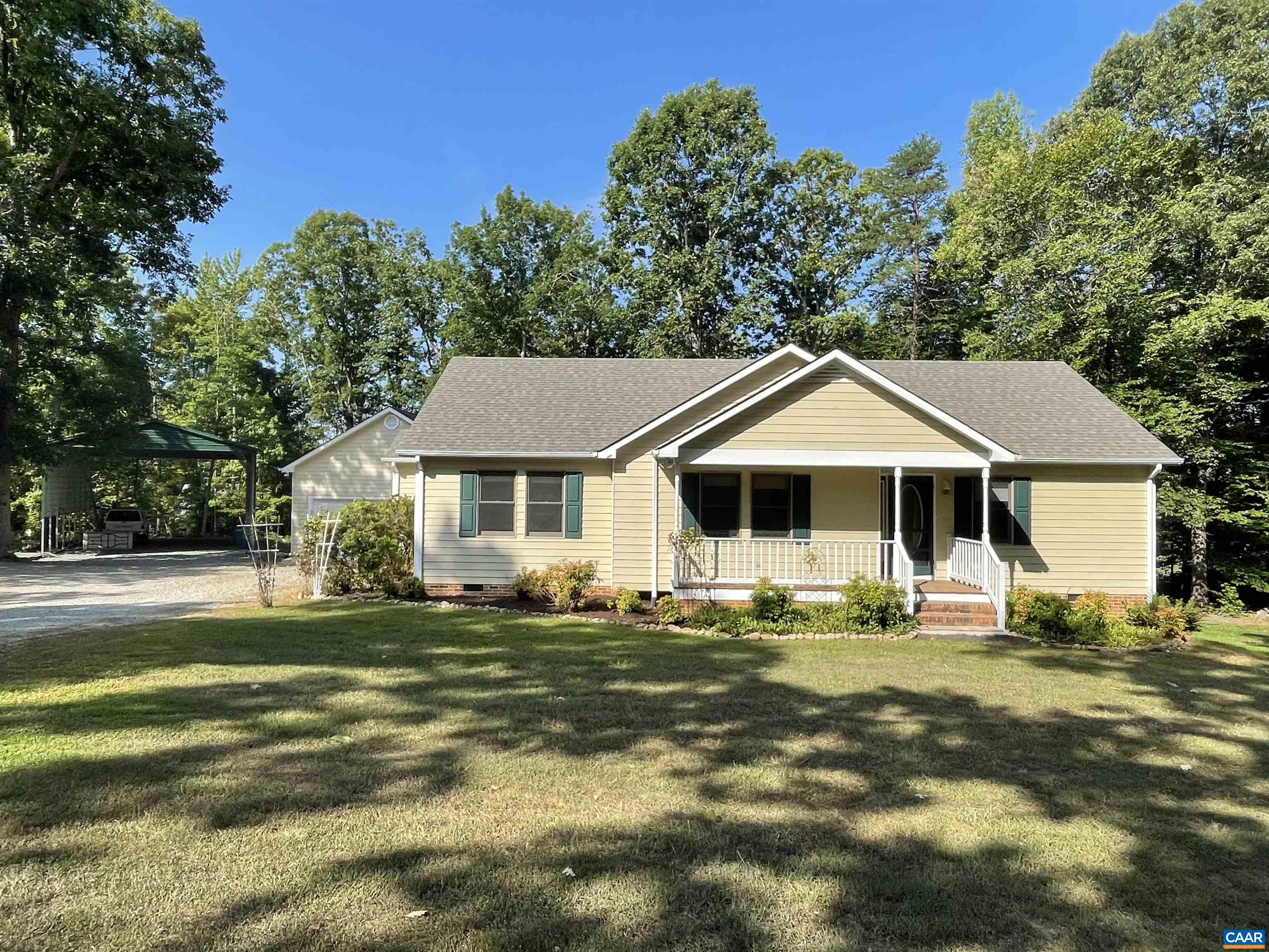 34 Fairview Lane Palmyra, VA 22963 - Photo 7 of 37 a front view of a house with garden