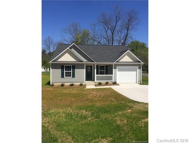 205 Reservation Road Catawba, SC 29704 - Photo 1 of 1 a front view of a house with a garden