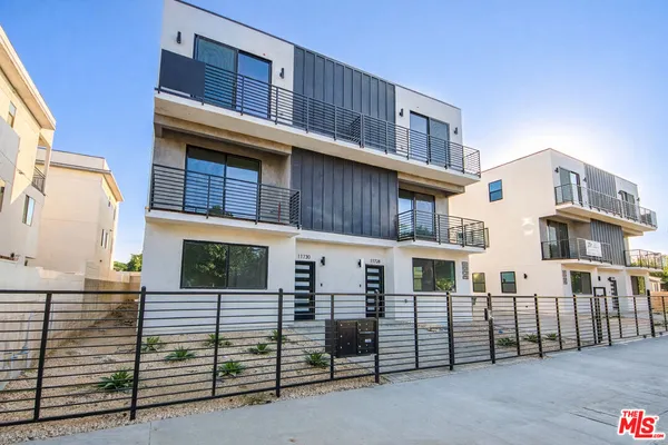 a view of a house with a balcony