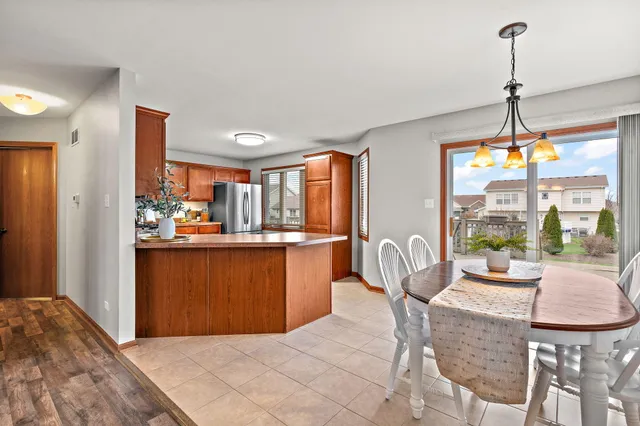 a bedroom with furniture and large windows
