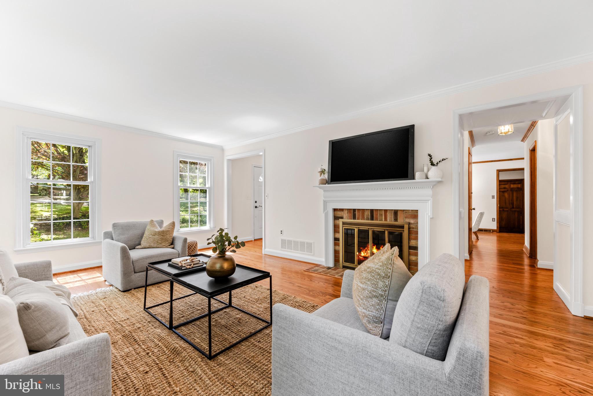 3912 Sweet Air Road Phoenix, MD 21131 - Photo 7 of 46 Living room features a gas fireplace.