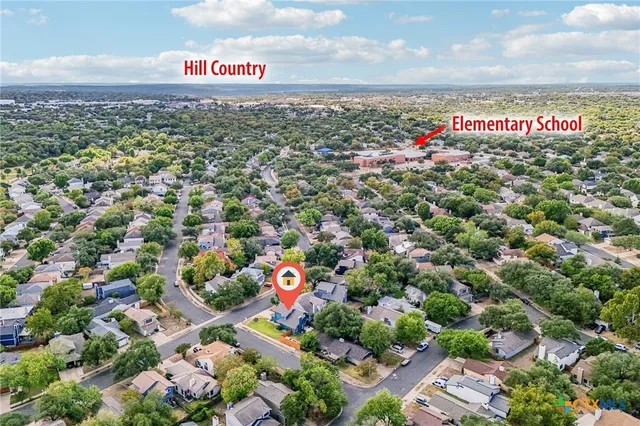 a view of a chairs and table on the terrace