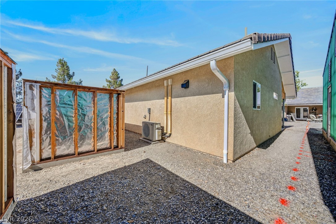3780 South Ranger Way Pahrump, NV 89048 - Photo 40 of 57 A well-maintained side yard offers ample space and access to the home's exterior.