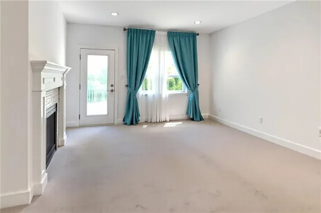 a view of livingroom with furniture and staircase