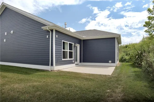 a front view of a house with garage
