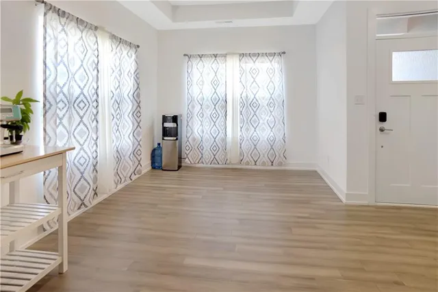 a view of entryway with wooden floor