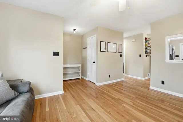 a view of a livingroom with wooden floor
