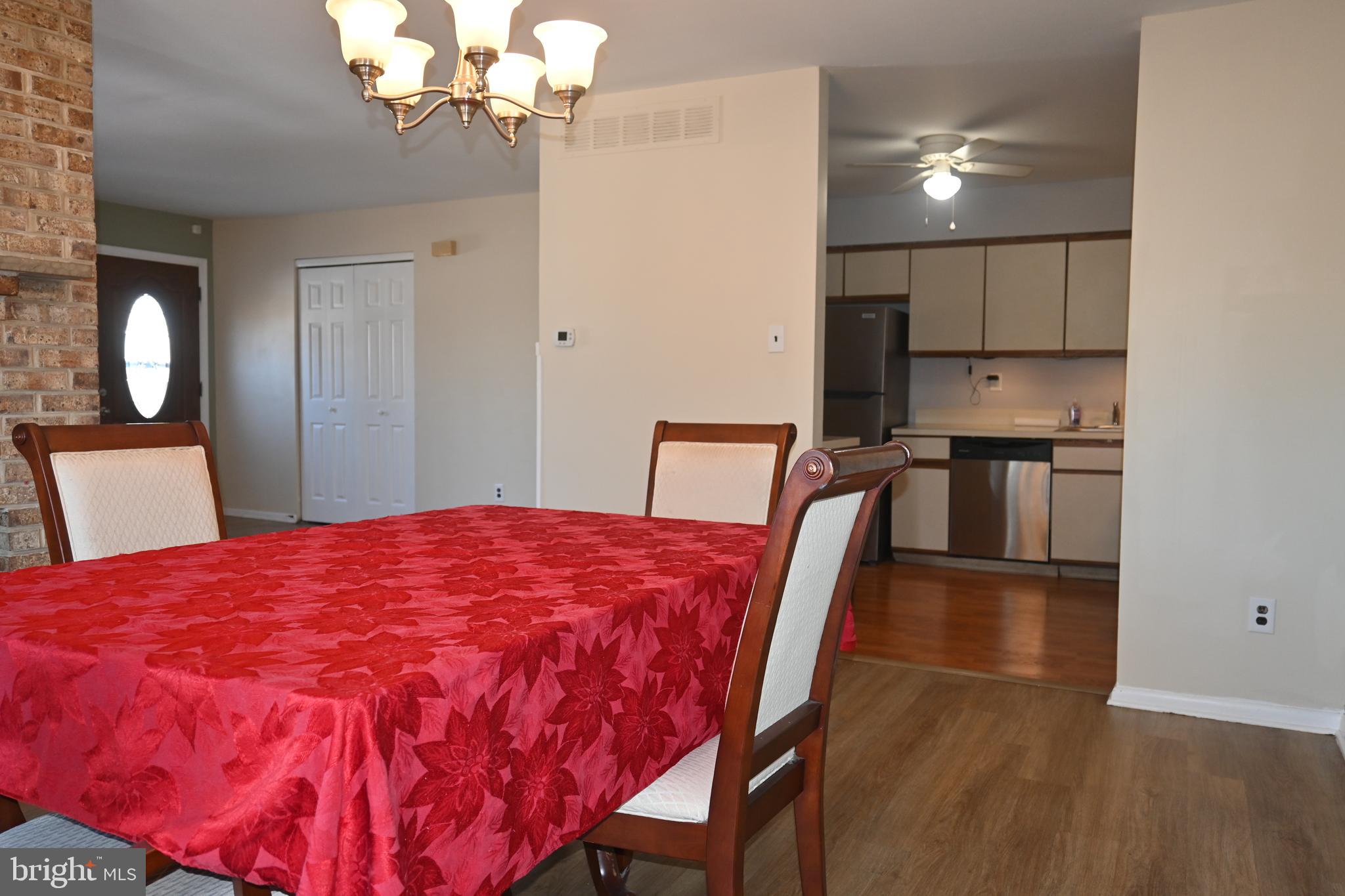 613 St Anthony Lane Upper Darby, PA 19082 - Photo 13 of 30 a bedroom with a bed and a mirror