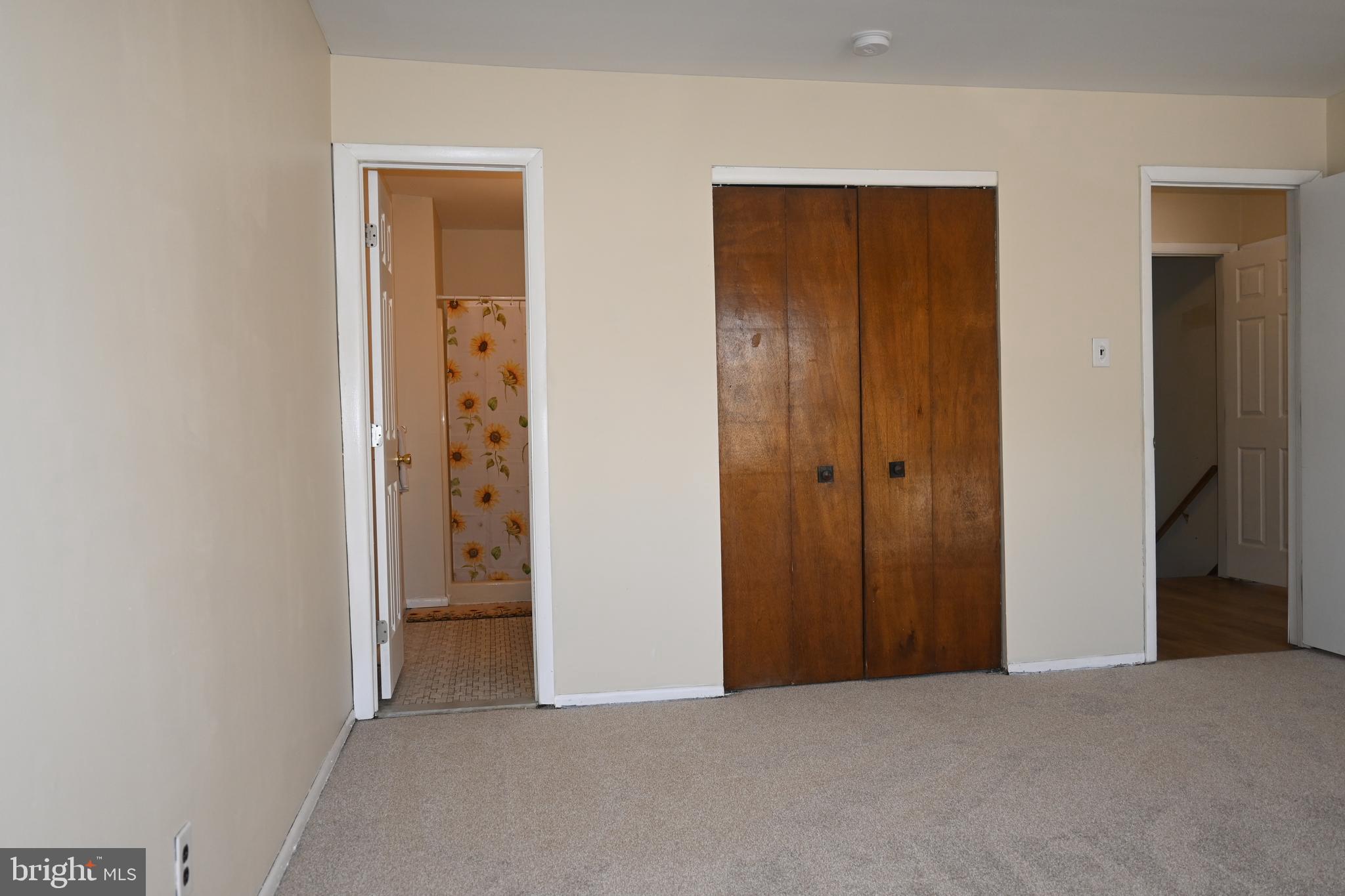 613 St Anthony Lane Upper Darby, PA 19082 - Photo 18 of 30 an empty room with closet and a bathroom
