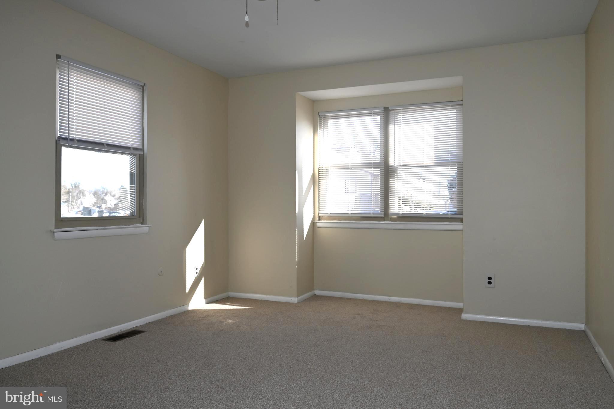 613 St Anthony Lane Upper Darby, PA 19082 - Photo 21 of 30 a view of empty room with windows