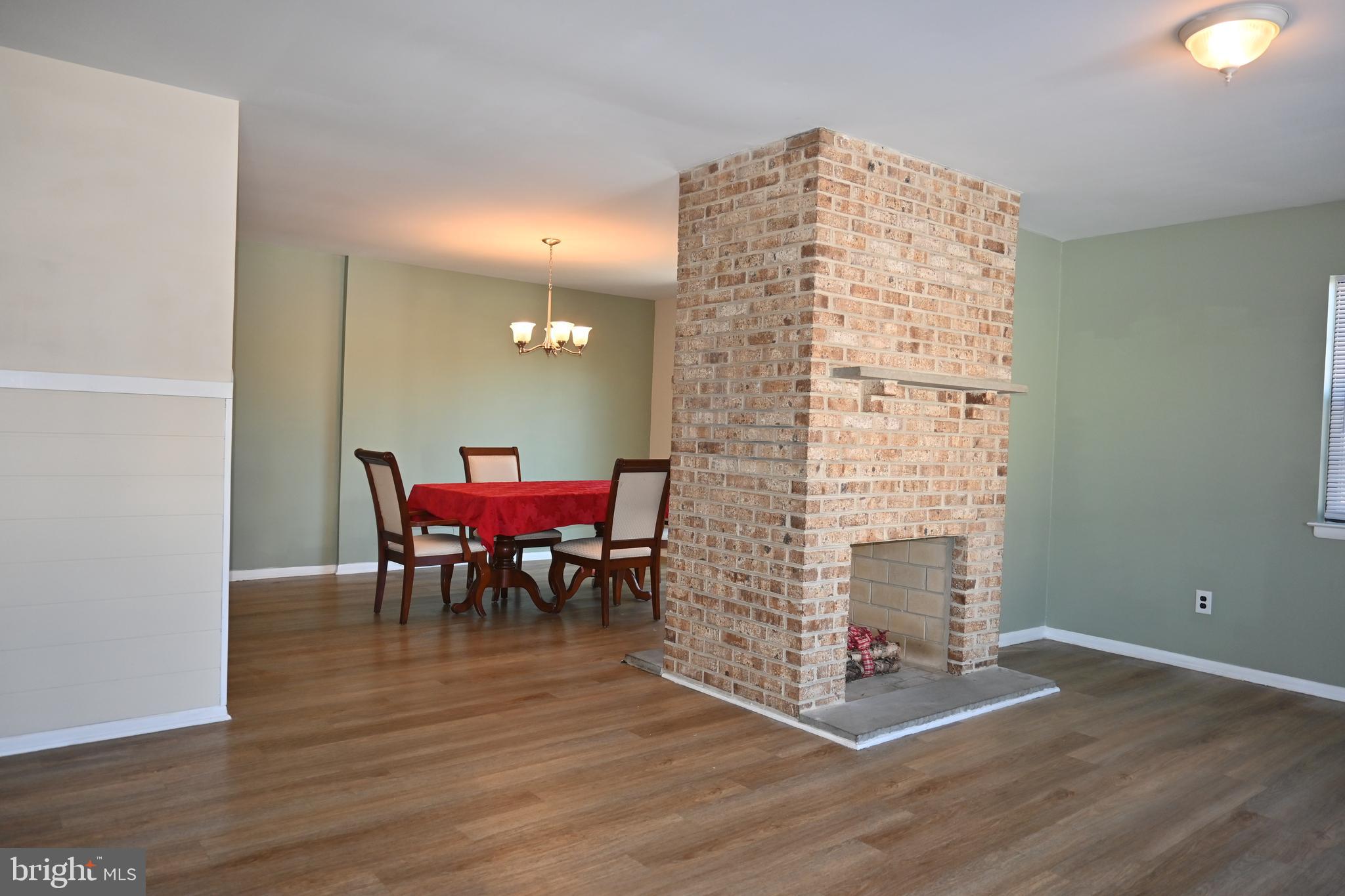 613 St Anthony Lane Upper Darby, PA 19082 - Photo 4 of 30 a view of a dining room with furniture and chandelier
