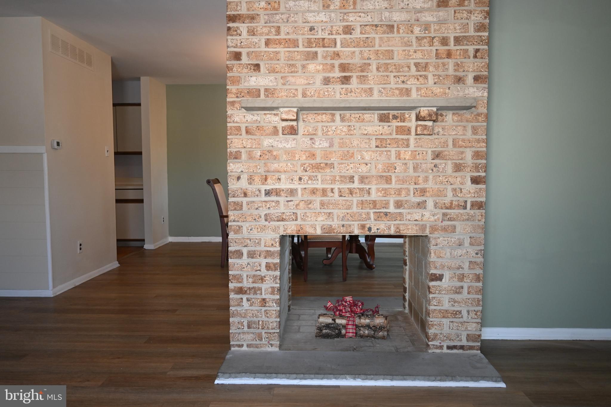613 St Anthony Lane Upper Darby, PA 19082 - Photo 8 of 30 a dining room with fireplace furniture and rug