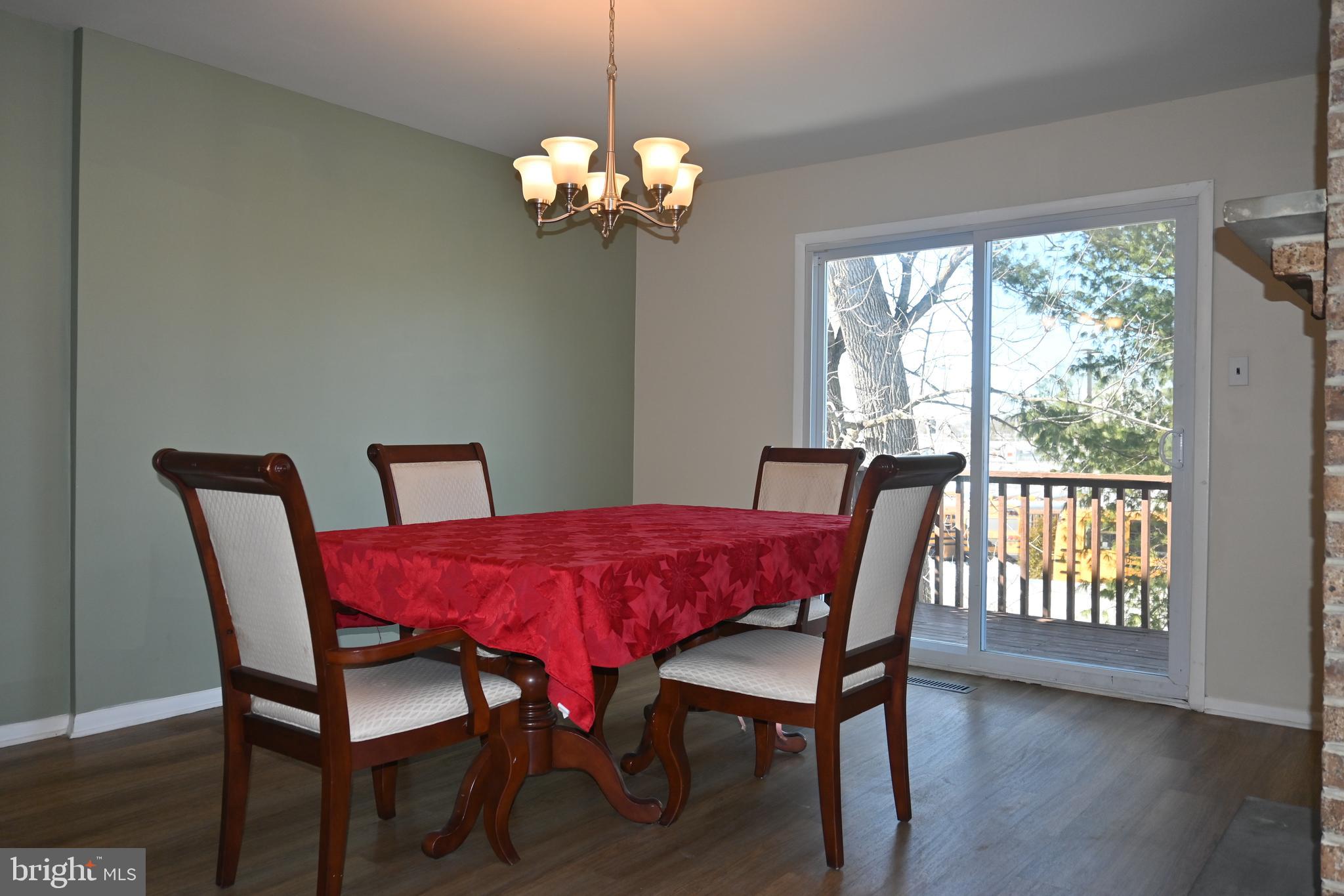 613 St Anthony Lane Upper Darby, PA 19082 - Photo 9 of 30 a view of a dining room with furniture window and wooden floor