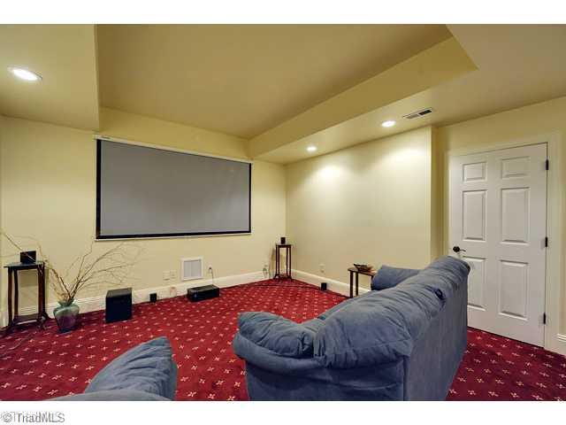 2130 Harper Road Clemmons, NC 27012 - Photo 14 of 16 Home Theatre. Theater room with tiers for movie chairs. Can you say family night or maybe FOOTBALL!!!