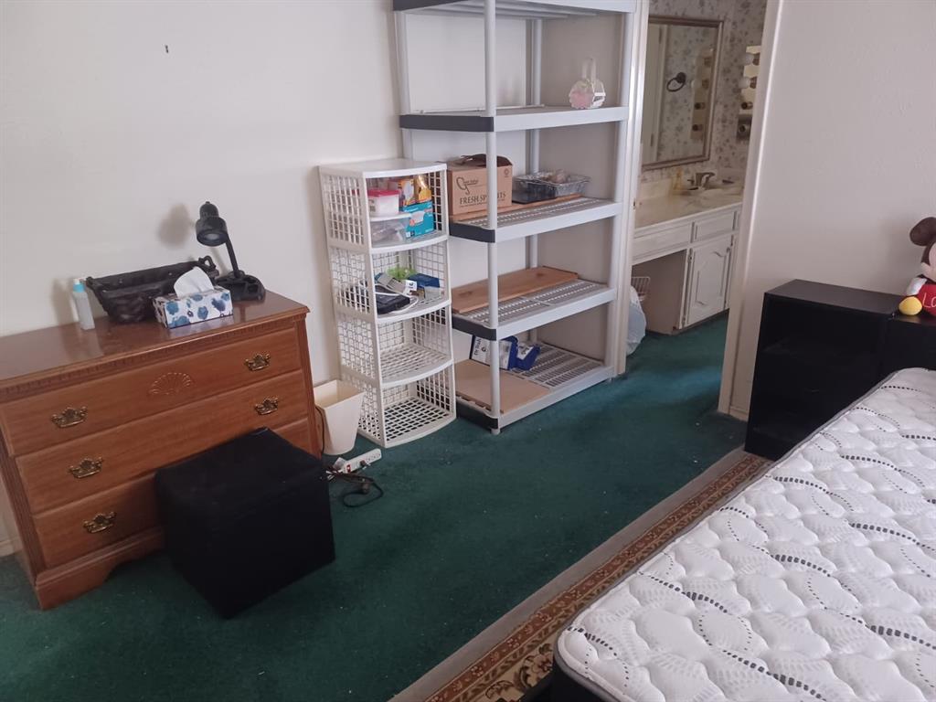 13114 Halwin Circle Dallas, TX 75243 - Photo 16 of 23 a room with storage and utility