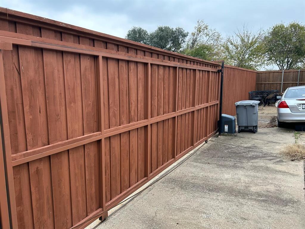 13114 Halwin Circle Dallas, TX 75243 - Photo 21 of 23 a view of a wooden fence