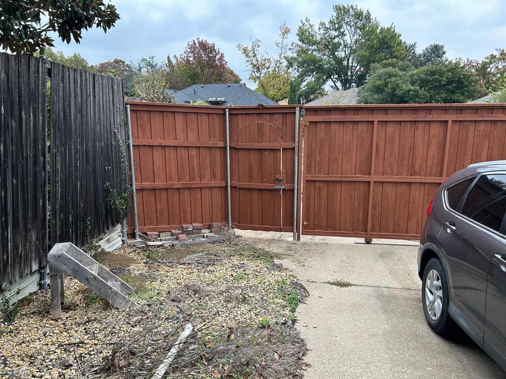 13114 Halwin Circle Dallas, TX 75243 - Photo 22 of 23 a view of a house with a backyard space