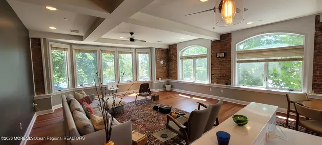 a living room with large window