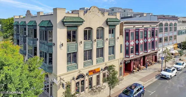 a front view of a building with glass windows