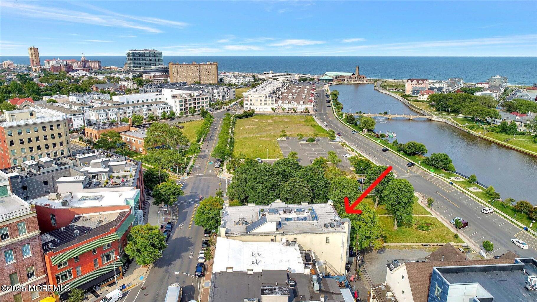 508 Cookman Avenue, Unit 204 Asbury Park, NJ 07712 - Photo 4 of 8 an aerial view of residential houses with outdoor space