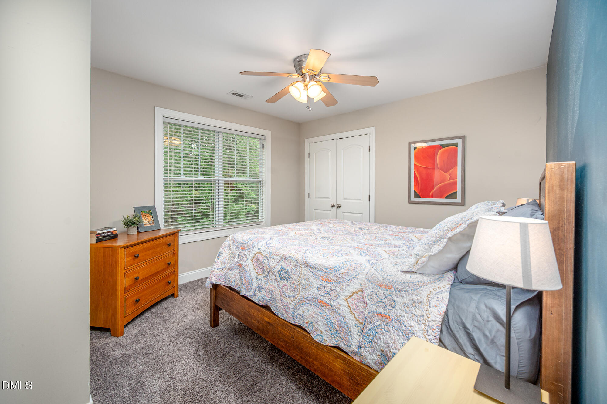 726 Ruth Circle Fuquay-Varina, NC 27526 - Photo 33 of 61 a bed room with a bed and a chandelier