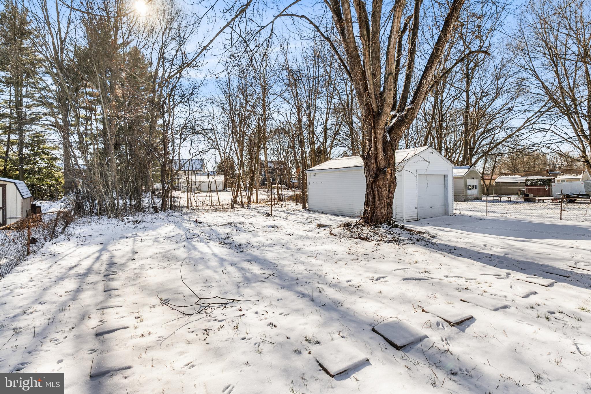 114 Brown Street Elkton, MD 21921 - Photo 14 of 15 a view of a backyard with snow on the road