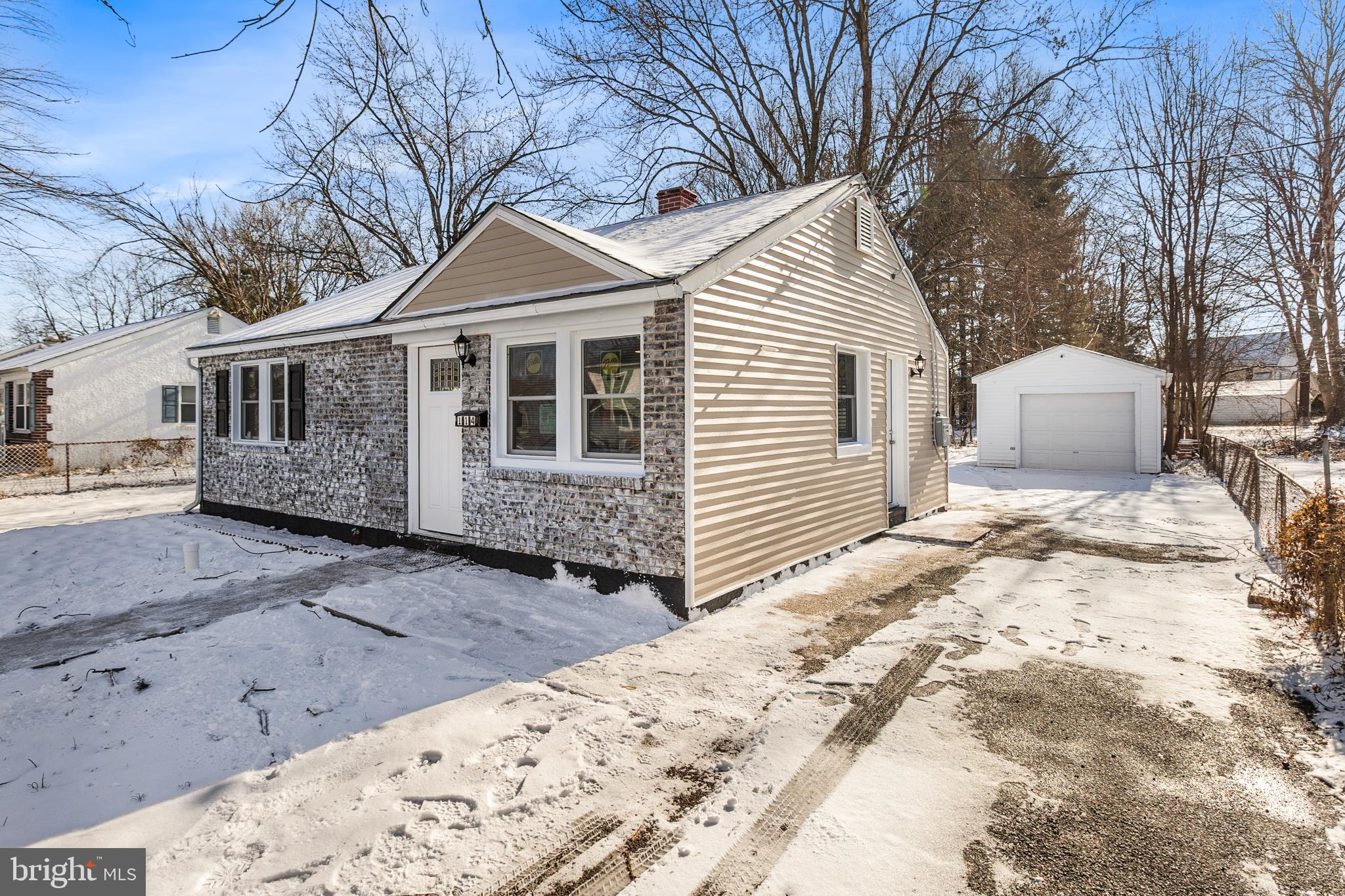 114 Brown Street Elkton, MD 21921 - Photo 3 of 15 a view of a white house with a large tree in front of it