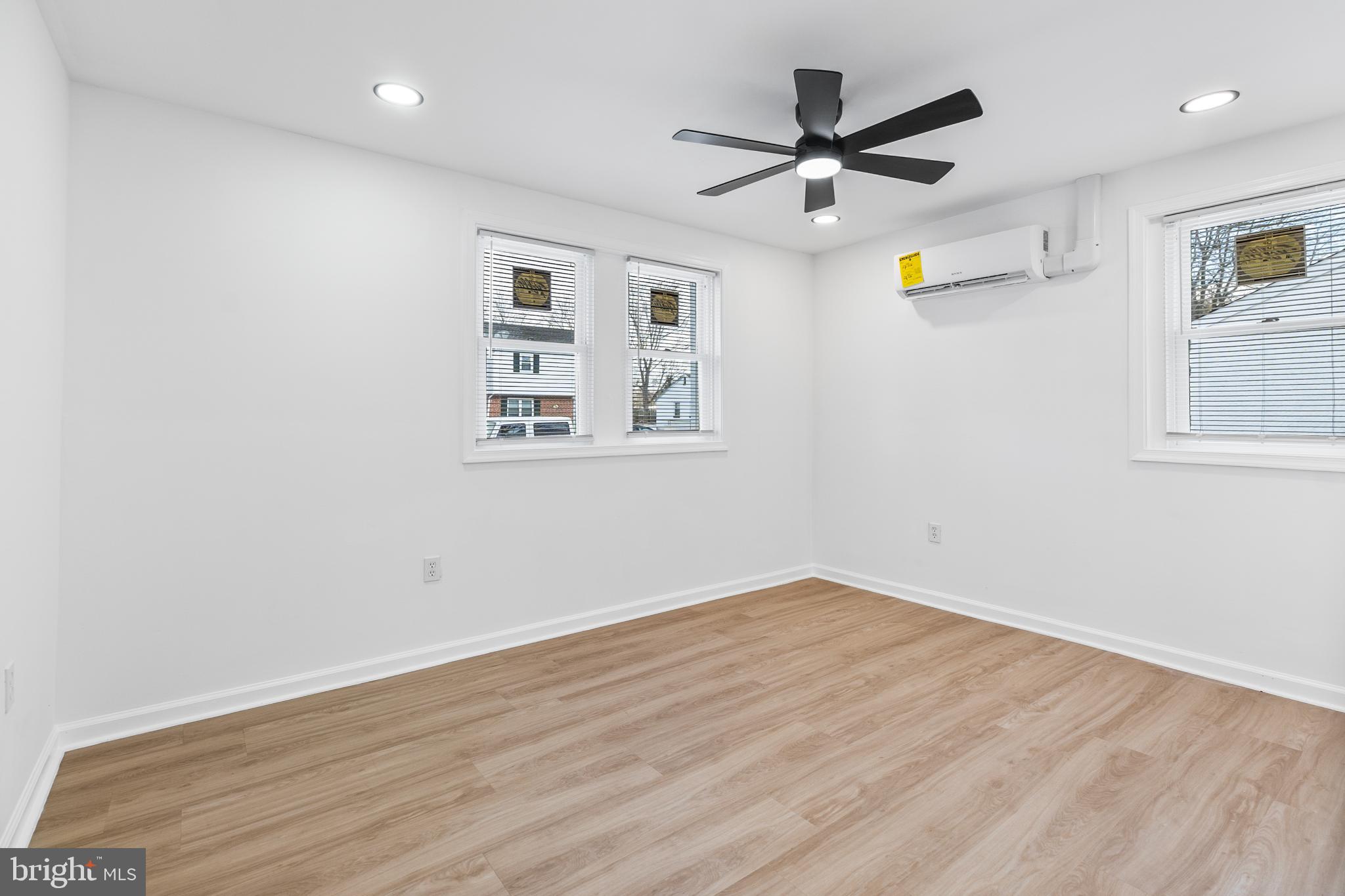 114 Brown Street Elkton, MD 21921 - Photo 8 of 15 a view of an empty room with a ceiling fan