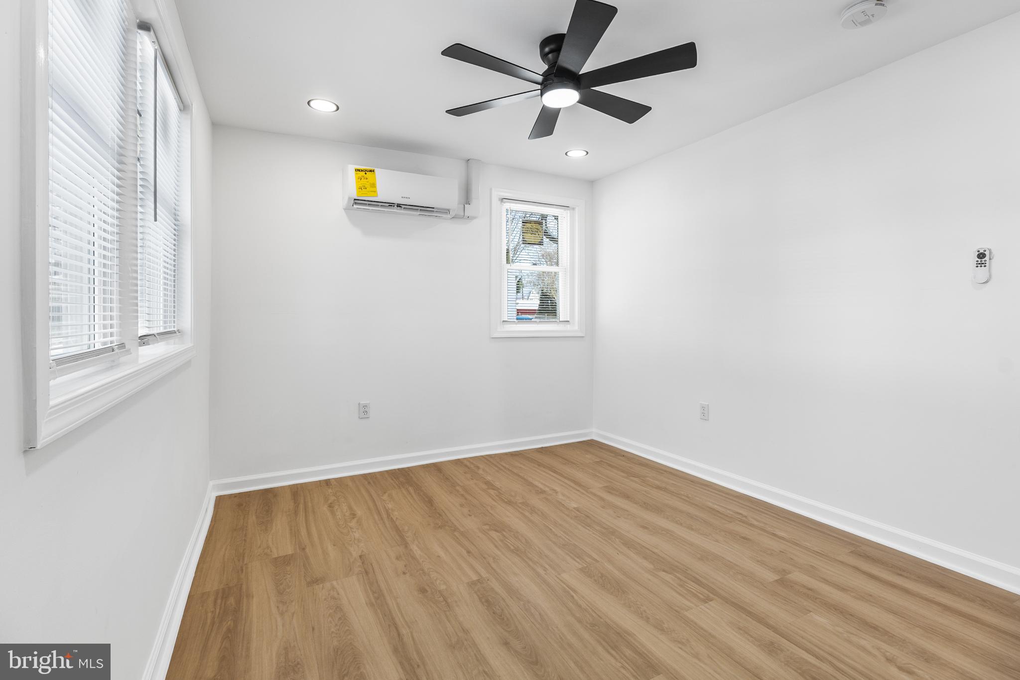 114 Brown Street Elkton, MD 21921 - Photo 9 of 15 an empty room with windows and fan