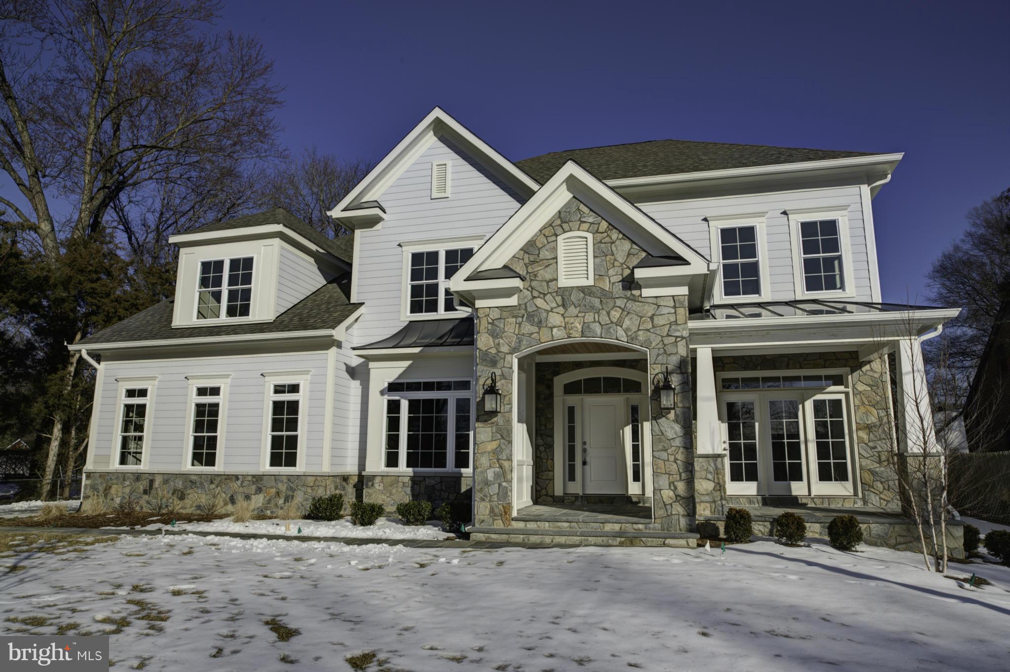 8713 Standish Road Alexandria, VA 22308 - Photo 1 of 1 a front view of a house with a yard