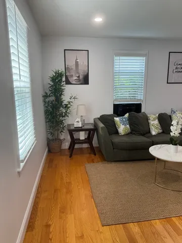a living room with furniture and a couch