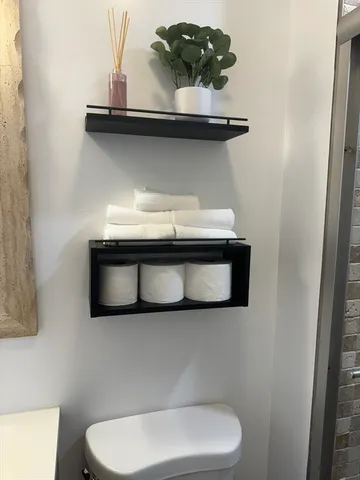 a bathroom with a toilet and a sink