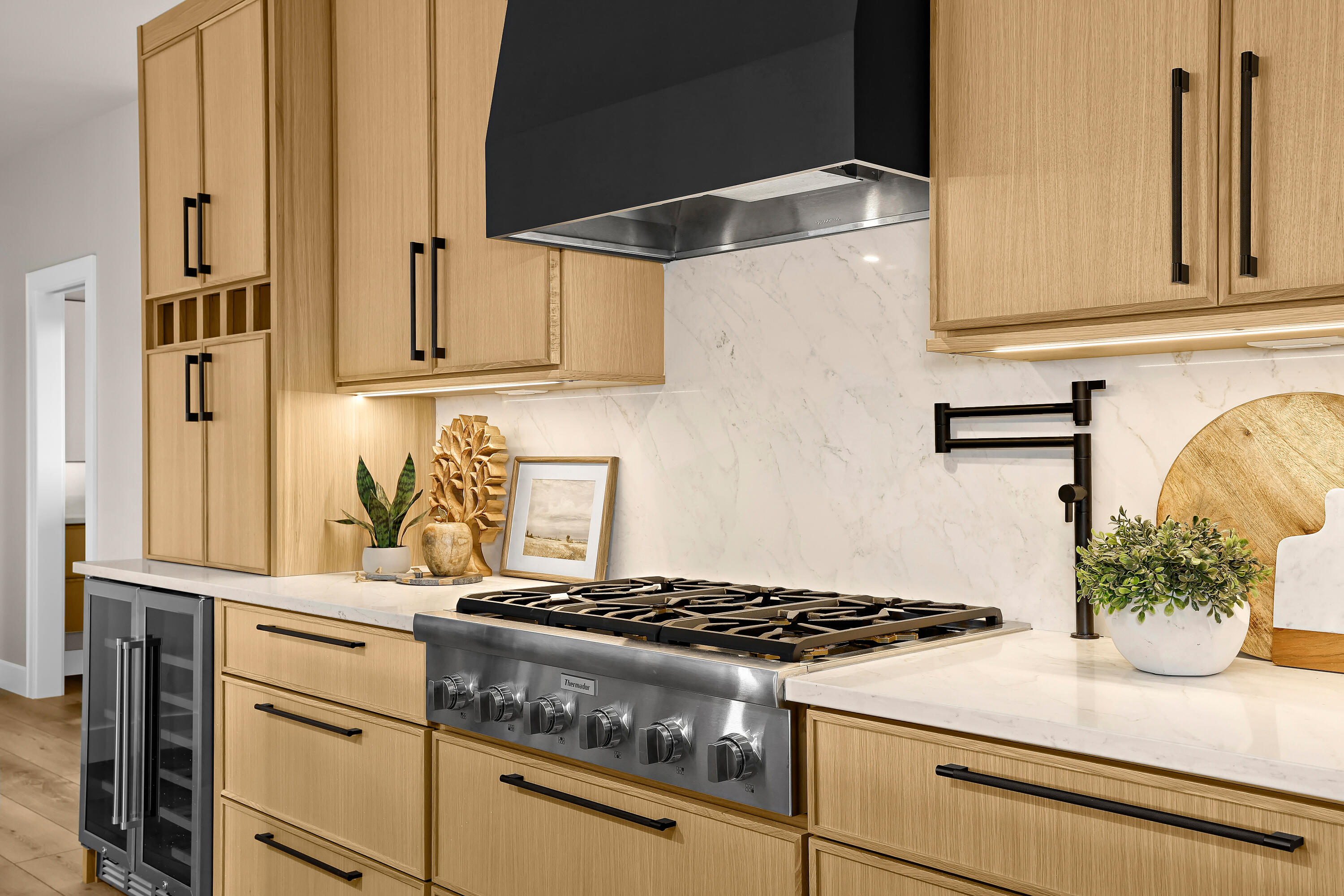 251 Weston Road Holmen, WI 54636 - Photo 12 of 49 Gas cooktop with custom vent hood