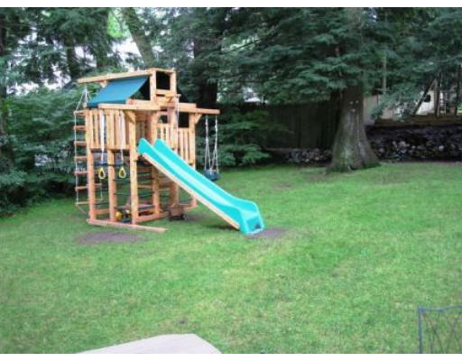156 Thornton Road Needham, MA 02492 - Photo 11 of 12 a view of backyard with deck and trees