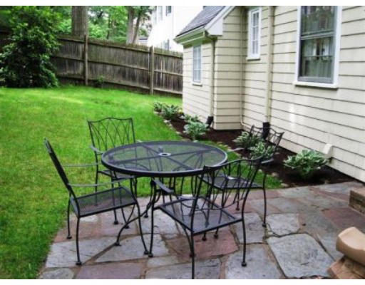 156 Thornton Road Needham, MA 02492 - Photo 12 of 12 a view of a chairs and table in backyard of the house