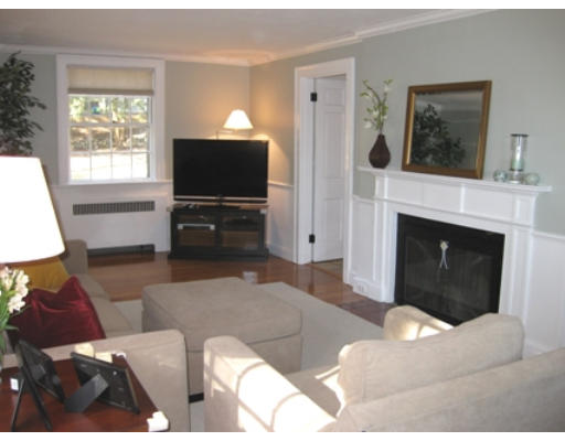 156 Thornton Road Needham, MA 02492 - Photo 2 of 12 a living room with furniture and a flat screen tv