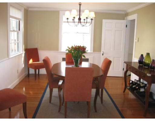 156 Thornton Road Needham, MA 02492 - Photo 4 of 12 a view of a dining room with furniture and a chandelier